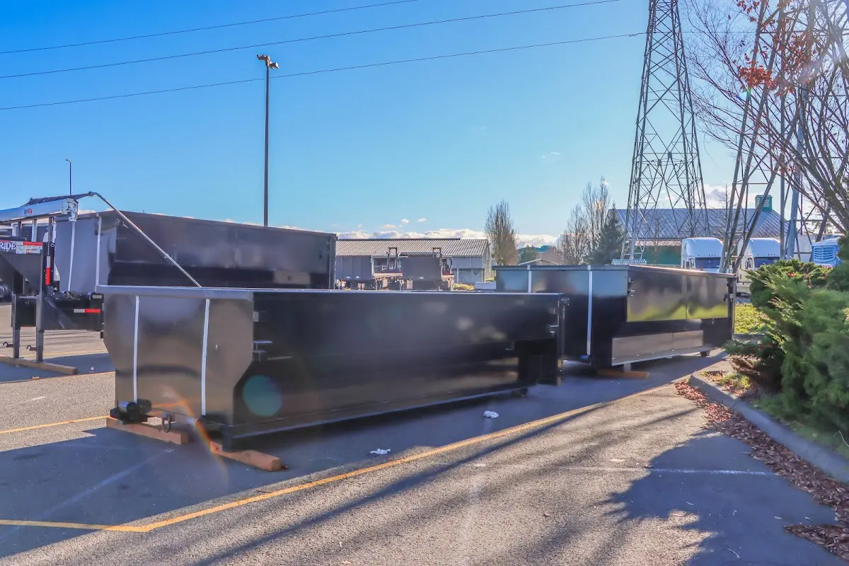 Roll-off dumpster ready for waste disposal at job site for 3 Yard Dumpster Rental in Lanham
